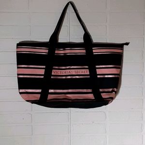 Pink and black victoria secret totebag.